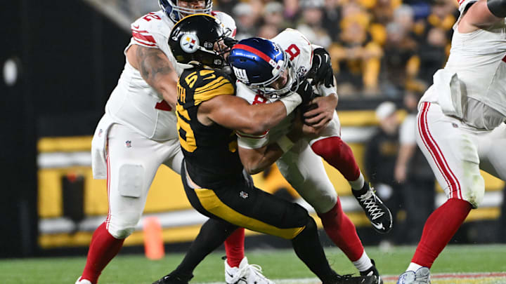 Oct 28, 2024; Pittsburgh, Pennsylvania, USA; Pittsburgh Steelers linebacker Alex Highsmith (56) sacks New York Giants quarterback Daniel Jones (8) during the third quarter at Acrisure Stadium. Mandatory Credit: Barry Reeger-Imagn Images