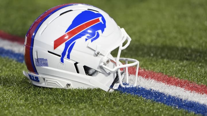 Detailed view of Buffalo Bills helmet on the field prior to the game against the Baltimore Ravens at Highmark Stadium.