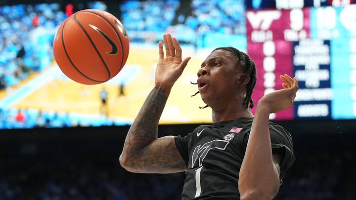 Feb 28, 2026; Chapel Hill, N.C; Virginia Tech forward Tobi Lawal (1) scores in the first half at Dean E. Smith Center.