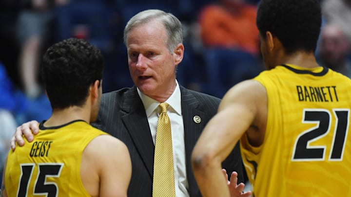 Mar 9, 2017; Nashville, TN, USA; Missouri Tigers head coach Kim Anderson talks with a pair of his guards.