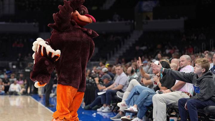 Mar 10, 2026; Charlotte, NC; The HokieBird interacts with fans during the first half against Wake Forest at Spectrum Center.
