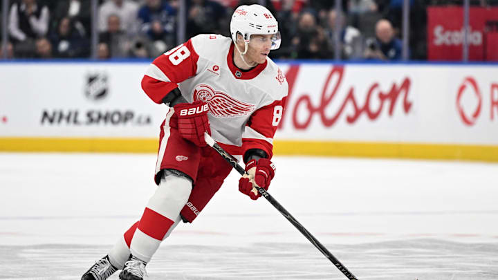 Jan 21, 2026; Toronto, Ontario, CAN;  Detroit Red Wings forward Patrick Kane (88) skates with the puck against the Toronto Maple Leafs in overtime at Scotiabank Arena. Mandatory Credit: Dan Hamilton-Imagn Images