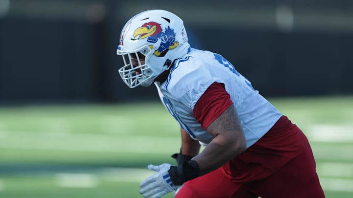 Kansas redshirt senior defensive lineman Gage Keys (99) works on drills during a spring practice on April 11, 2025. Kansas redshirt senior defensive lineman Gage Keys (99) works on drills during a spring practice on April 11, 2025.