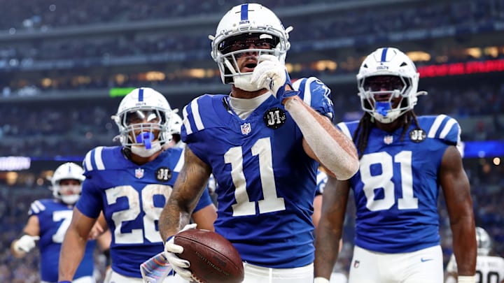 Oct 5, 2025; Indianapolis, Indiana, USA; Indianapolis Colts wide receiver Michael Pittman (11) celebrates with teammates after scoring a touchdown against the Las Vegas Raiders during the second quarter at Lucas Oil Stadium. Oct 5, 2025; Indianapolis, Indiana, USA; Indianapolis Colts wide receiver Michael Pittman (11) celebrates with teammates after scoring a touchdown against the Las Vegas Raiders during the second quarter at Lucas Oil Stadium.