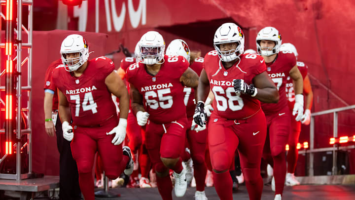 Aug 10, 2024; Glendale, Arizona, USA; Arizona Cardinals guard Isaiah Adams (74), offensive tackle Elijah Wilkinson (65) and Kelvin Beachum (68) against the New Orleans Saints during a preseason NFL game at State Farm Stadium. Mandatory Credit: Mark J. Rebilas-Imagn Images
Aug 10, 2024; Glendale, Arizona, USA; Arizona Cardinals guard Isaiah Adams (74), offensive tackle Elijah Wilkinson (65) and Kelvin Beachum (68) against the New Orleans Saints during a preseason NFL game at State Farm Stadium. Mandatory Credit: Mark J. Rebilas-Imagn Images