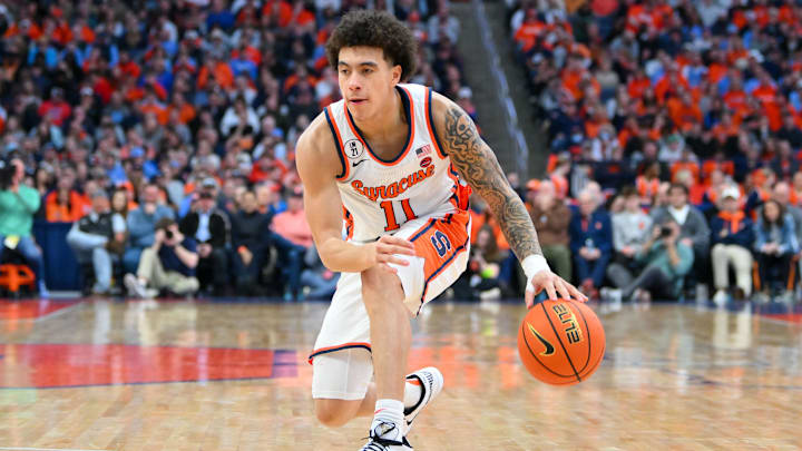 Feb 21, 2026; Syracuse, New York, USA; Syracuse Orange guard Naithan George (11) dribbles during the second half against the North Carolina Tar Heels at the JMA Wireless Dome. Mandatory Credit: Rich Barnes-Imagn Images Feb 21, 2026; Syracuse, New York, USA; Syracuse Orange guard Naithan George (11) dribbles during the second half against the North Carolina Tar Heels at the JMA Wireless Dome. Mandatory Credit: Rich Barnes-Imagn Images