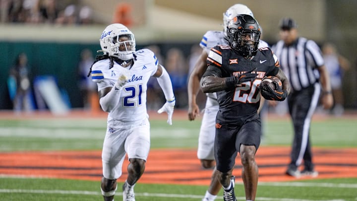 Oklahoma State running back Rodney Fields Jr. (20) runs the ball in the third quarter during an NCAA football game between Oklahoma State (OSU) and Tulsa at Boone Pickens Stadium in Stillwater, Okla., on Friday, Sept. 19, 2025. Oklahoma State running back Rodney Fields Jr. (20) runs the ball in the third quarter during an NCAA football game between Oklahoma State (OSU) and Tulsa at Boone Pickens Stadium in Stillwater, Okla., on Friday, Sept. 19, 2025.