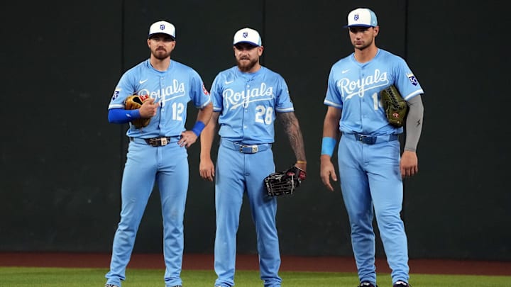 Jul 5, 2025; Phoenix, Arizona, USA; Kansas City Royals left fielder Nick Loftin (12), center fielder Kyle Isbel (28), and Jac Caglianone in the fifth inning against the Arizona Diamondbacks at Chase Field. Mandatory Credit: Rick Scuteri-Imagn Images Jul 5, 2025; Phoenix, Arizona, USA; Kansas City Royals left fielder Nick Loftin (12), center fielder Kyle Isbel (28), and Jac Caglianone in the fifth inning against the Arizona Diamondbacks at Chase Field. Mandatory Credit: Rick Scuteri-Imagn Images