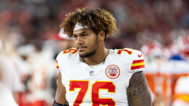 Aug 9, 2025; Glendale, Arizona, USA; Kansas City Chiefs offensive tackle Kingsley Suamataia (76) against the Arizona Cardinals during a preseason NFL game at State Farm Stadium. Mandatory Credit: Mark J. Rebilas-Imagn Images