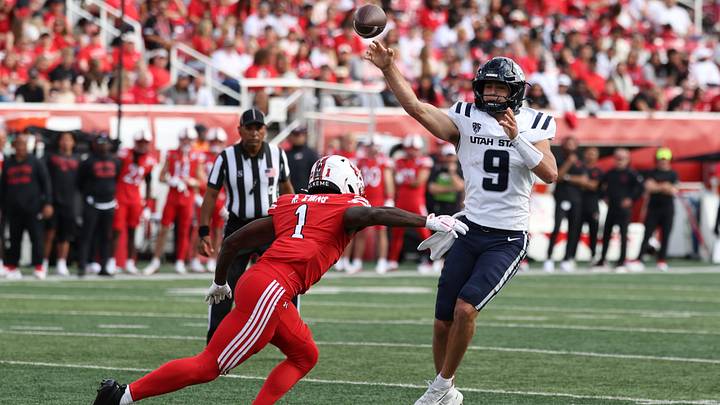 Utah safety Rabbit Evans hurries Utah State quarterback Grady Brosterhous. Utah safety Rabbit Evans hurries Utah State quarterback Grady Brosterhous.