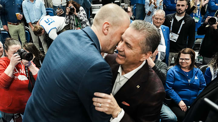 Former Kentucky coach and current Arkansas coach John Calipari hugs Wildcats coach Mark Pope before the game Saturday Feb. 1, 2025 at Rupp Arena in Lexington, Kentucky.