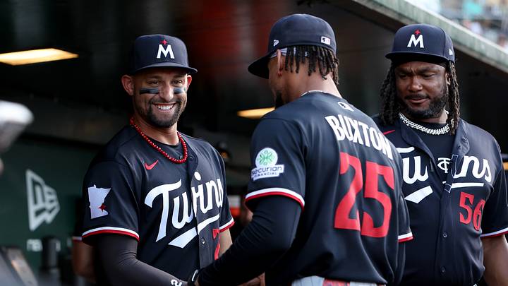 Aug 25, 2026; West Sacramento, California, USA;  Minnesota Twins first baseman Royce Lewis (23) shakes hands with center fielder Byron Buxton (25) before the start of the game against the Athletics at Sutter Health Park.  Mandatory Credit: Dennis Lee-Imagn Images
