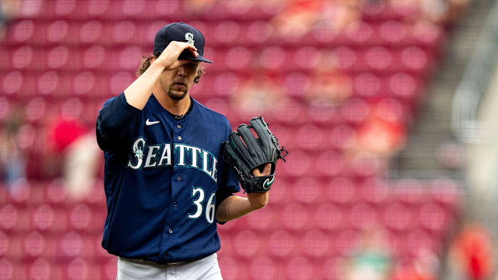 Seattle Mariners starting pitcher Logan Gilbert (36) adjusts his hat before pitching in the first inning of the MLB baseball game between the Cincinnati Reds and the Seattle Mariners at Great American Ball Park in Cincinnati on Wednesday, Sept. 6, 2023.