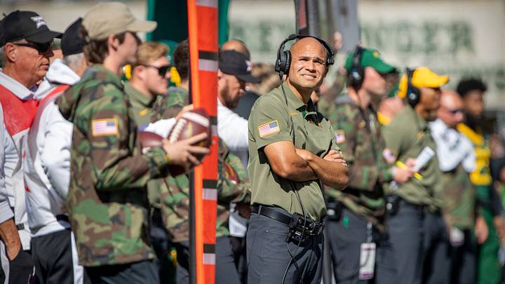 Nov 13, 2021; Waco, Texas, USA; Baylor Bears head coach Dave Aranda checked the scoreboard during the first half against the Oklahoma Sooners at McLane Stadium. Mandatory Credit: Jerome Miron-USA TODAY Sports Nov 13, 2021; Waco, Texas, USA; Baylor Bears head coach Dave Aranda checked the scoreboard during the first half against the Oklahoma Sooners at McLane Stadium. Mandatory Credit: Jerome Miron-USA TODAY Sports
