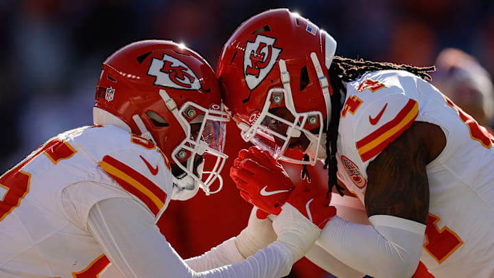 Jan 5, 2025; Denver, Colorado, USA; Kansas City Chiefs linebacker Joshua Uche (55) and linebacker Cam Jones (44) before the game against the Denver Broncos at Empower Field at Mile High. Mandatory Credit: Isaiah J. Downing-Imagn Images