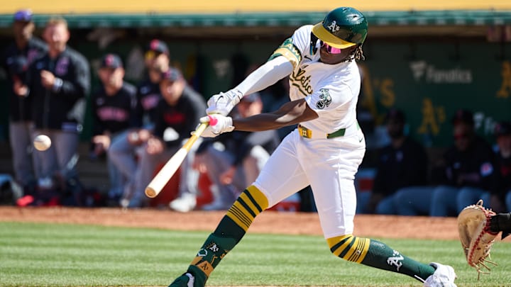 Mar 31, 2024; Oakland, California, USA; Oakland Athletics outfielder Lawrence Butler (4) hits a