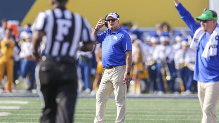 Sep 13, 2025; Morgantown, West Virginia, USA; Pittsburgh Panthers head coach Pat Narduzzi calls over a referee during the second quarter against the West Virginia Mountaineers at Milan Puskar Stadium. Mandatory Credit: Ben Queen-Imagn Images
