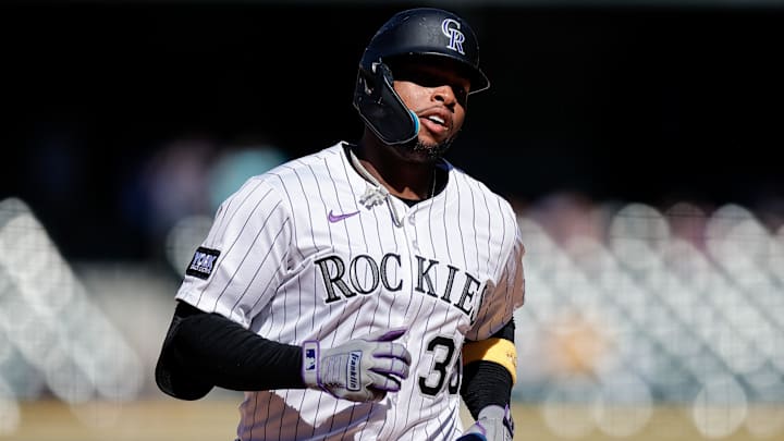 Sep 18, 2025; Denver, Colorado, USA; Colorado Rockies designated hitter Yanquiel Fernandez (35) rounds the bases on a solo home run in the seventh inning against the Miami Marlins at Coors Field. Mandatory Credit: Isaiah J. Downing-Imagn Images