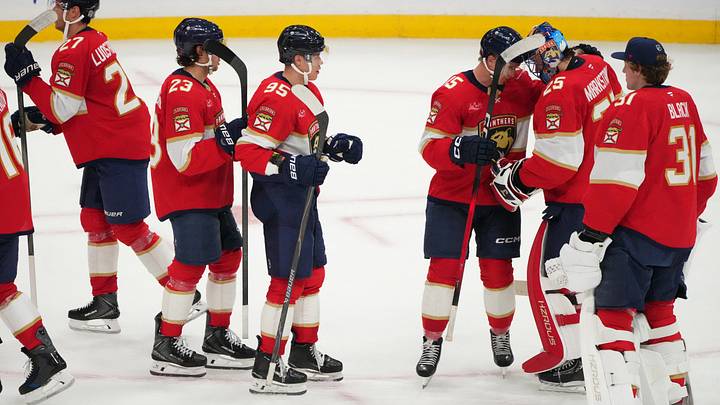 Florida Panthers center Anton Lundell (15) celebrates a win over the Carolina Hurricanes with goaltender Jacob Markstrom (25) at Amerant Bank Arena. Mandatory Credit: Jim Rassol-Imagn Images Florida Panthers center Anton Lundell (15) celebrates a win over the Carolina Hurricanes with goaltender Jacob Markstrom (25) at Amerant Bank Arena. Mandatory Credit: Jim Rassol-Imagn Images