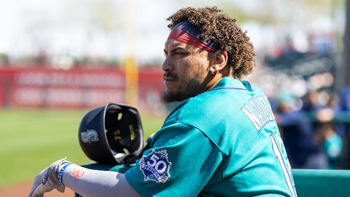 Feb 25, 2026; Surprise, Arizona, USA; Seattle Mariners infielder Josh Naylor against the Kansas City Royals during a spring training game at Surprise Stadium. Mandatory Credit: Mark J. Rebilas-Imagn Images