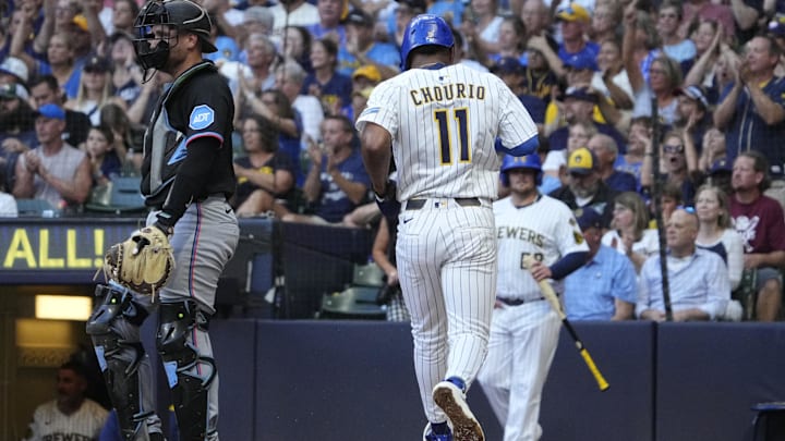 Jul 26, 2025; Milwaukee, Wisconsin, USA; Milwaukee Brewers outfielder Jackson Chourio (11) scores a run against the Milwaukee Brewers in the fourth inning at American Family Field. Mandatory Credit: Michael McLoone-Imagn Images