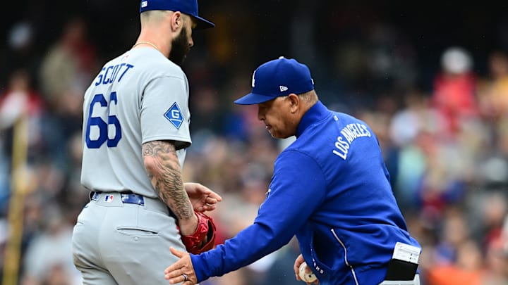Dodgers manager Dave Roberts (30) relieves relief pitcher Tanner Scott (66) during the eighth inning against the Cleveland Guardians at Progressive Field on May 28.