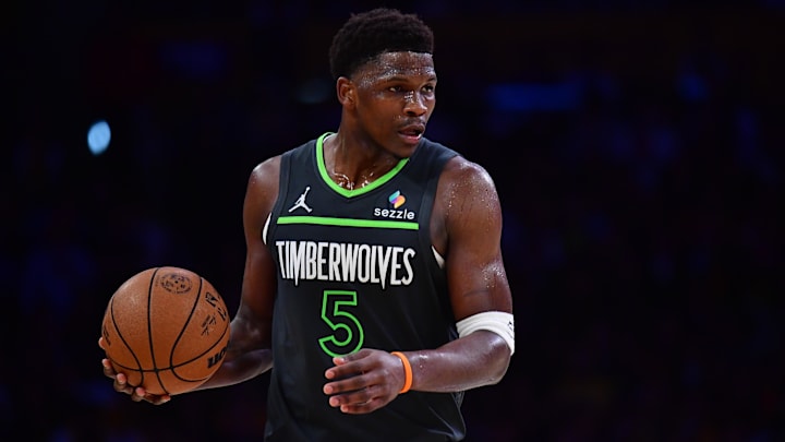 Apr 30, 2025; Los Angeles, California, USA; Minnesota Timberwolves guard Anthony Edwards (5) moves the ball against the Los Angeles Lakers during the second half in game five of first round for the 2025 NBA Playoffs at Crypto.com Arena.