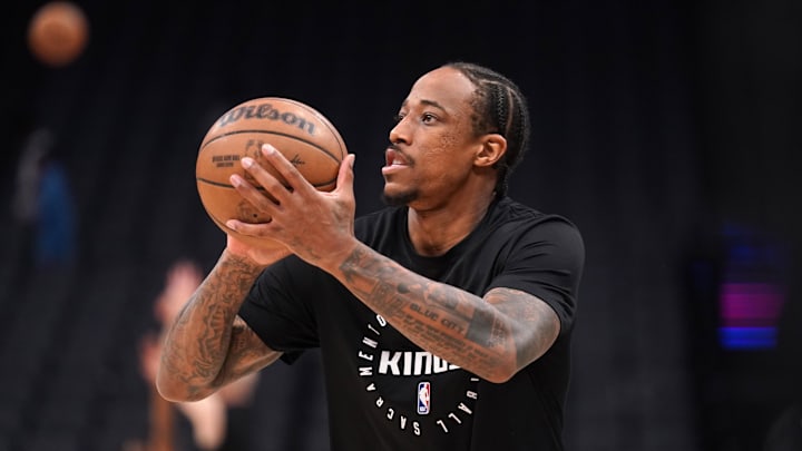 Mar 25, 2025; Sacramento, California, USA; Sacramento Kings guard DeMar DeRozan (10) warms up before the start of the game against the Oklahoma City Thunder at the Golden 1 Center. Mandatory Credit: Cary Edmondson-Imagn Images