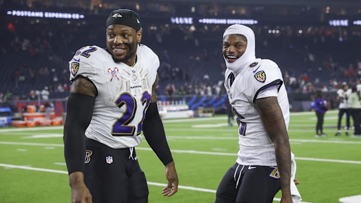 Baltimore Ravens running back Derrick Henry (22) and quarterback Lamar Jackson (8) smile after the game against the Houston Texans at NRG Stadium.