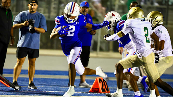 Folsom's Jameson Powell had five catches for 55 yards and a touchdown in his team's 63-20 win over Long Beach Poly Aug. 23 2024. Powell is a four-star junior receiver with 16 college offers.  On Friday he had three TD catches in a romp over Oak Ridge.