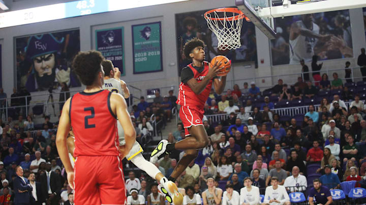 Jaxon Richardson of the Miami Columbus High School basketball team drives to the basket during the championship game against Montverde at the City of Palms Classic at Suncoast Credit Union Arena in Fort Myers on Monday, Dec. 23, 2024.
