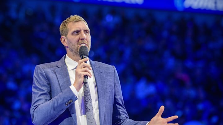 Jan 5, 2022; Dallas, Texas, USA; Former Dallas Mavericks player Dirk Nowitzki speaks to the fans as Nowitzki has his number 41 jersey retired after the game between the Dallas Mavericks and the Golden State Warriors at the American Airlines Center. Mandatory Credit: Jerome Miron-Imagn Images