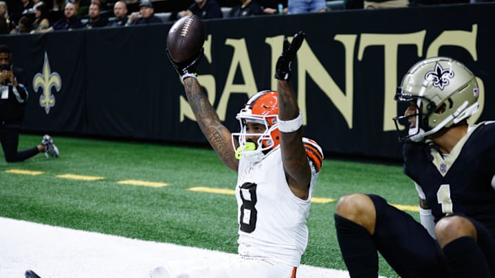 Tennessee Titans safety Kevin Byard (31) tackles Cleveland Browns wide receiver Elijah Moore (8) during the third quarter in Cleveland, Ohio, Sunday, Sept. 24, 2023.