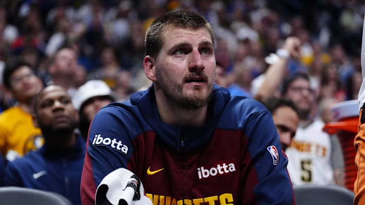 May 9, 2025; Denver, Colorado, USA; Denver Nuggets center Nikola Jokic (15) on the bench in the fourth quarter against the Oklahoma City Thunder during game three of the second round for the 2025 NBA Playoffs at Ball Arena. Mandatory Credit: Ron Chenoy-Imagn Images
