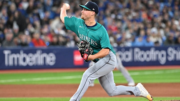Apr 29, 2023; Toronto, Ontario, CAN; Seattle Mariners relief pitcher Trevor Gott (30) delivers a pitch against the Toronto Blue Jays in the tenth inning at Rogers Centre. Mandatory Credit: Dan Hamilton-Imagn Images