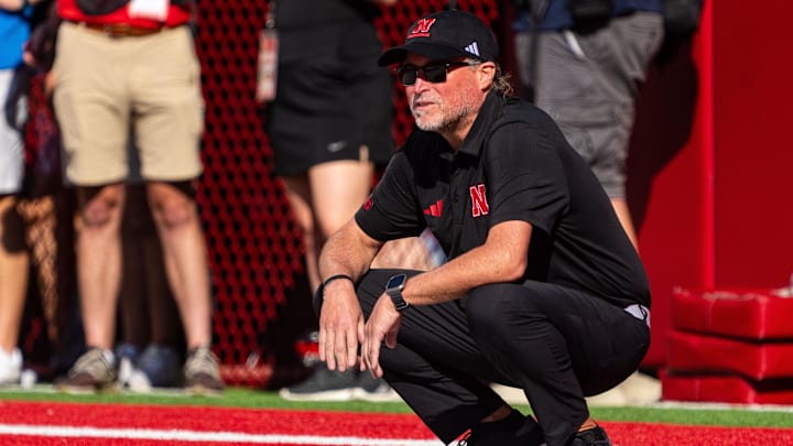 Nebraska Cornhuskers assistant coach Dana Holgorsen watches during warmups before the game against the Houston Christian Huskies at Memorial Stadium.