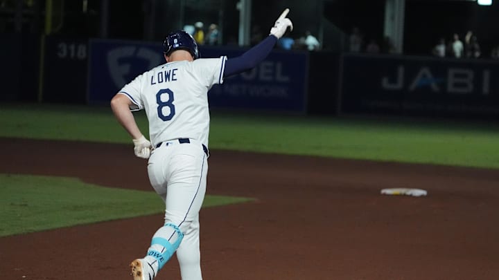 Sep 21, 2025; Tampa, Florida, USA; Tampa Bay Rays second base Brandon Lowe (8) runs the bases after hitting a home run against the Boston Red Sox during the sixth inning at George M. Steinbrenner Field. 