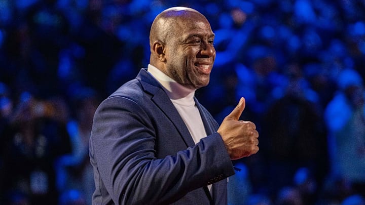 February 20, 2022; Cleveland, Ohio, USA; NBA great Magic Johnson is honored for being selected to the NBA 75th Anniversary Team during halftime in the 2022 NBA All-Star Game at Rocket Mortgage FieldHouse. Mandatory Credit: Kyle Terada-Imagn Images