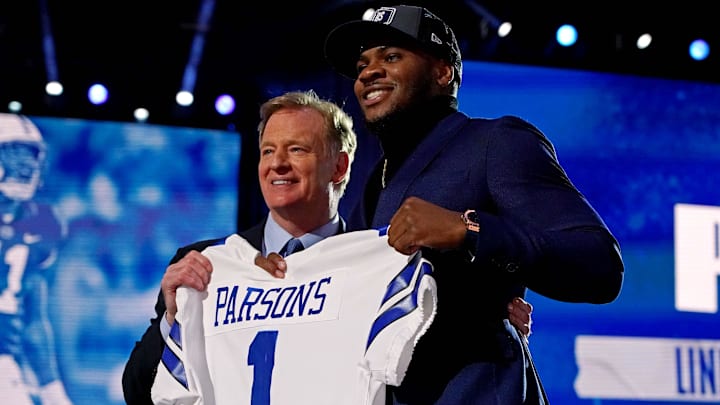 Apr 29, 2021; Cleveland, Ohio, USA; Micah Persons (Penn State) with NFL commissioner Roger Goodell
