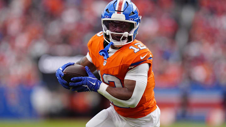 Oct 26, 2025; Denver, Colorado, USA; Denver Broncos running back RJ Harvey (12) runs against the Dallas Cowboys in the second half at Empower Field at Mile High. Mandatory Credit: Ron Chenoy-Imagn Images Oct 26, 2025; Denver, Colorado, USA; Denver Broncos running back RJ Harvey (12) runs against the Dallas Cowboys in the second half at Empower Field at Mile High. Mandatory Credit: Ron Chenoy-Imagn Images