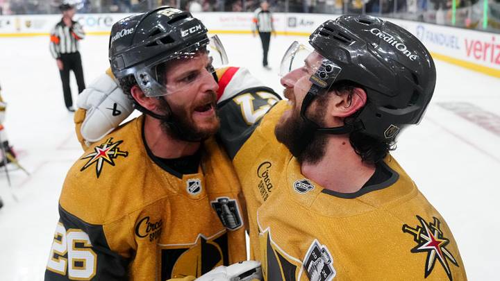 Jun 6, 2026; Las Vegas, Nevada, USA; Vegas Golden Knights defenseman Shea Theodore (27) celebrates with center Nic Dowd (26) after scoring a goal against the Carolina Hurricanes during the second overtime in game three of the 2026 Stanley Cup Final at T-Mobile Arena. Mandatory Credit: Stephen R. Sylvanie-Imagn Images