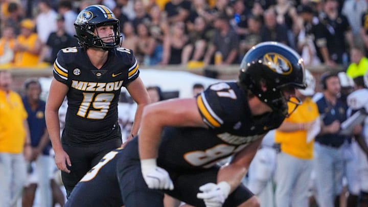 Aug 29, 2024; Columbia, Missouri, USA; Missouri Tigers place kicker Blake Craig (19) prepares to kick the point after touchdown against the Murray State Racers during the game at Faurot Field at Memorial Stadium. Mandatory Credit: Denny Medley-Imagn Images