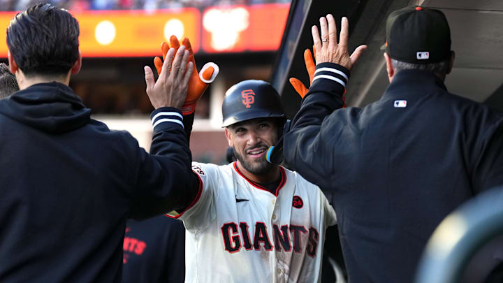 Jun 26, 2024; San Francisco, California, USA; San Francisco Giants first baseman David Villar (center) is congratulated by teammates after hitting a home run against the Chicago Cubs during the second inning at Oracle Park Jun 26, 2024; San Francisco, California, USA; San Francisco Giants first baseman David Villar (center) is congratulated by teammates after hitting a home run against the Chicago Cubs during the second inning at Oracle Park