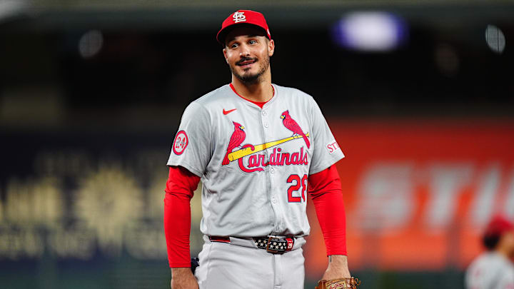 Sep 25, 2024; Denver, Colorado, USA; St. Louis Cardinals third base Nolan Arenado (28) reacts in the third inning against the Colorado Rockies at Coors Field. Mandatory Credit: Ron Chenoy-Imagn Images