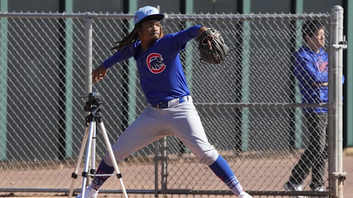 Feb 16, 2024; Mesa, AZ, USA; Chicago Cubs starting pitcher Michael Arias (82) throws in the bullpen during Spring Training camp at Sloan Park.