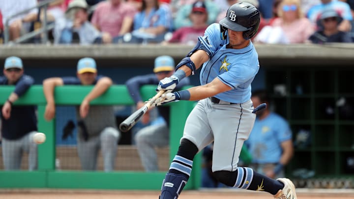 Mar 24, 2025; Clearwater, Florida, USA;   Tampa Bay Rays  outfielder Colton Ledbetter (10) singles during the second inning against the Philadelphia Phillies at BayCare Ballpark. Mandatory Credit: Kim Klement Neitzel-Imagn Images