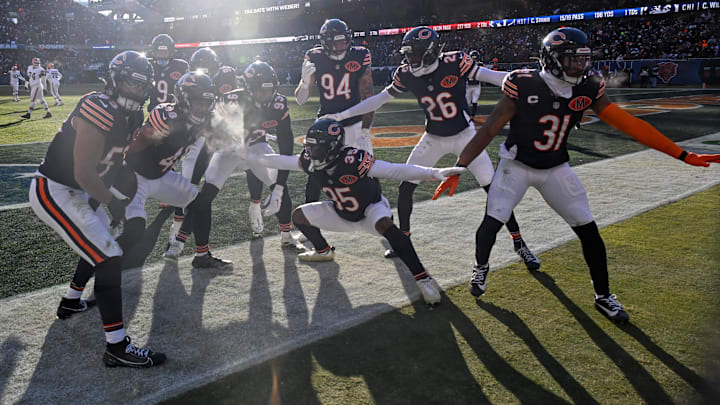 Dec 14, 2025; Chicago, Illinois, USA; Chicago Bears linebacker D'Marco Jackson (48) and Chicago Bears safety C.J. Gardner-Johnson (35) celebrate after an interception during the third quarter against the Cleveland Browns at Soldier Field. Mandatory Credit: Matt Marton-Imagn Images
