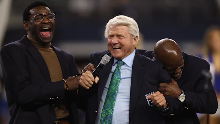 Former Dallas Cowboys Michael Irvin, Jimmy Johnson and Emmitt Smith react during the Ring of Honor ceremony at the half time of the game against the Detroit Lions.