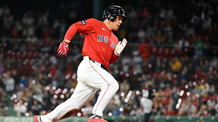 Sep 22, 2024; Boston, MA, USA; Boston Red Sox designated hitter Masataka Yoshida (7) scores on an RBI by catcher Connor Wong (12) (not pictured) during the sixth inning against the Minnesota Twins at Fenway Park. Mandatory Credit: Eric Canha-Imagn Images Sep 22, 2024; Boston, MA, USA; Boston Red Sox designated hitter Masataka Yoshida (7) scores on an RBI by catcher Connor Wong (12) (not pictured) during the sixth inning against the Minnesota Twins at Fenway Park. Mandatory Credit: Eric Canha-Imagn Images