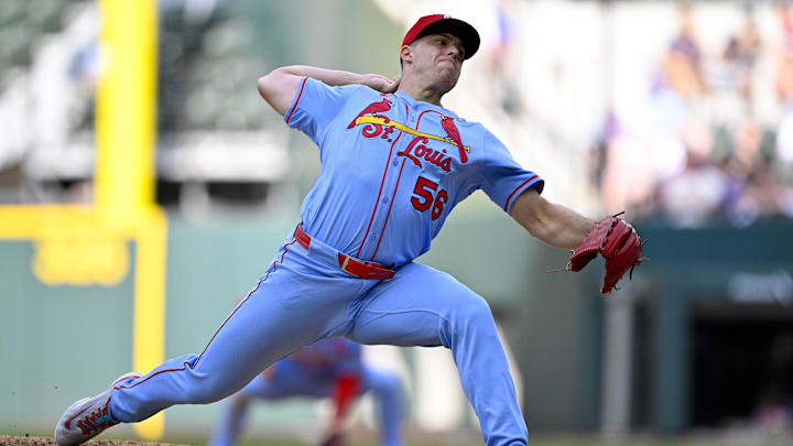 May 31, 2025; Arlington, Texas, USA; St. Louis Cardinals relief pitcher Ryan Helsley (56) pitches against the Texas Rangers during the ninth inning at Globe Life Field. Mandatory Credit: Jerome Miron-Imagn Images